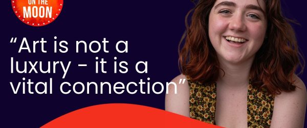 A promo graphic for an article on the ramps website. A dark blue rectangle with a red swish across the base and the red round ramps logo top left. on the right is a head and shoulders shot of Shosh Jones, she is smiling. The words reads - Art is not a luxury - it is a vital connection. An article from Shosh jones, progject manager for Rmaps on the Moon